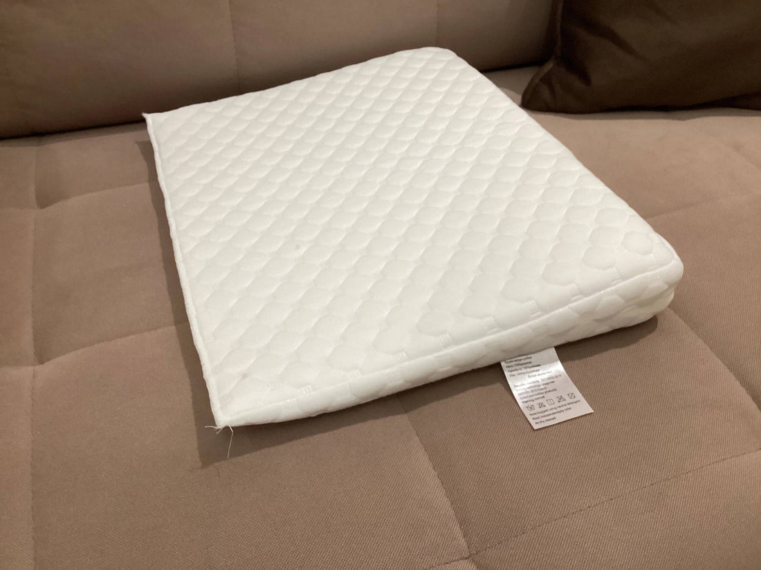 Coussin bebe incliné