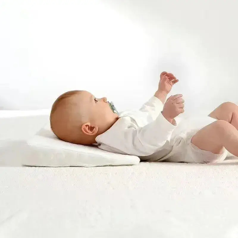 Coussin bébé incliné