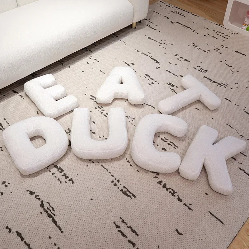 Coussin lettres