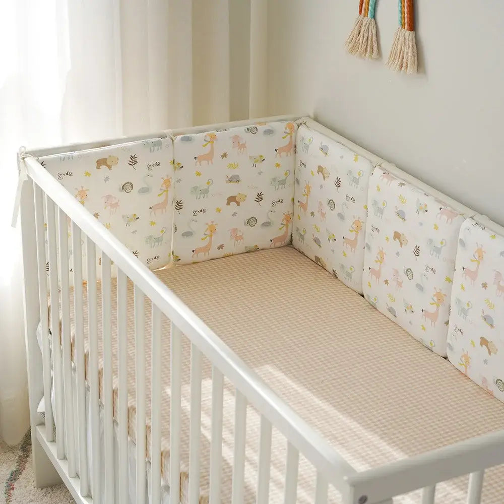 Coussin protection lit bébé
