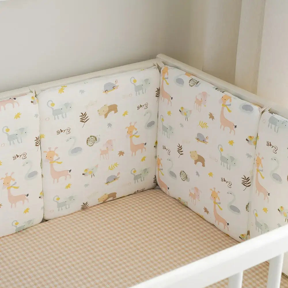 Coussin protection lit bébé