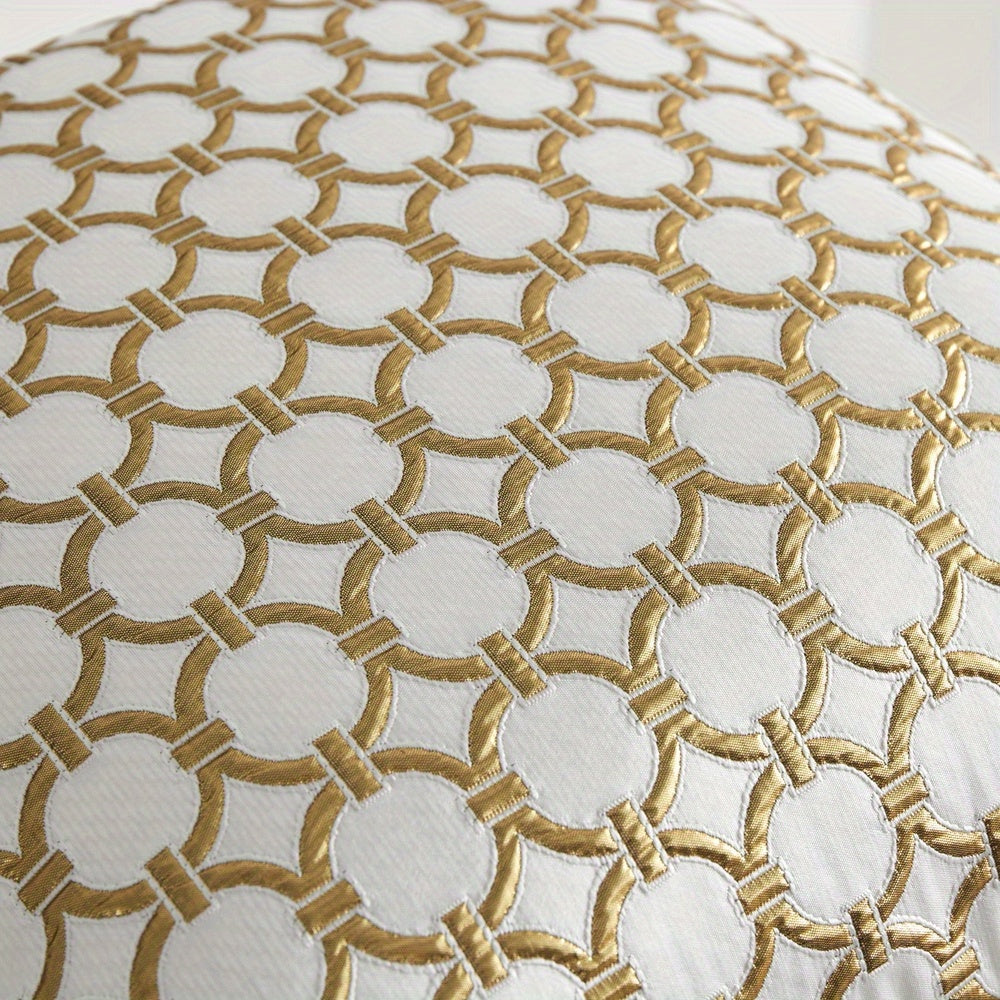 Housse de coussin blanc et or