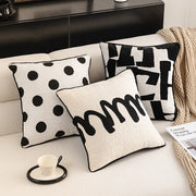 Housse de coussin noir et blanc