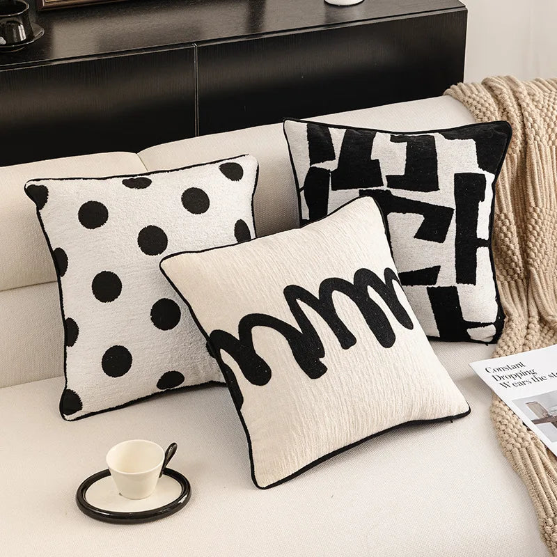 Housse de coussin noir et blanc
