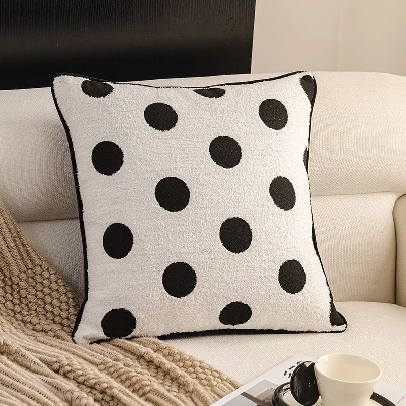 Housse de coussin noir et blanc - points